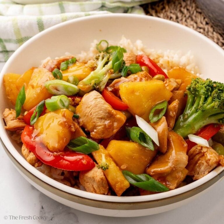 Chicken teriyaki bowl served with rice and garnished with green onions.