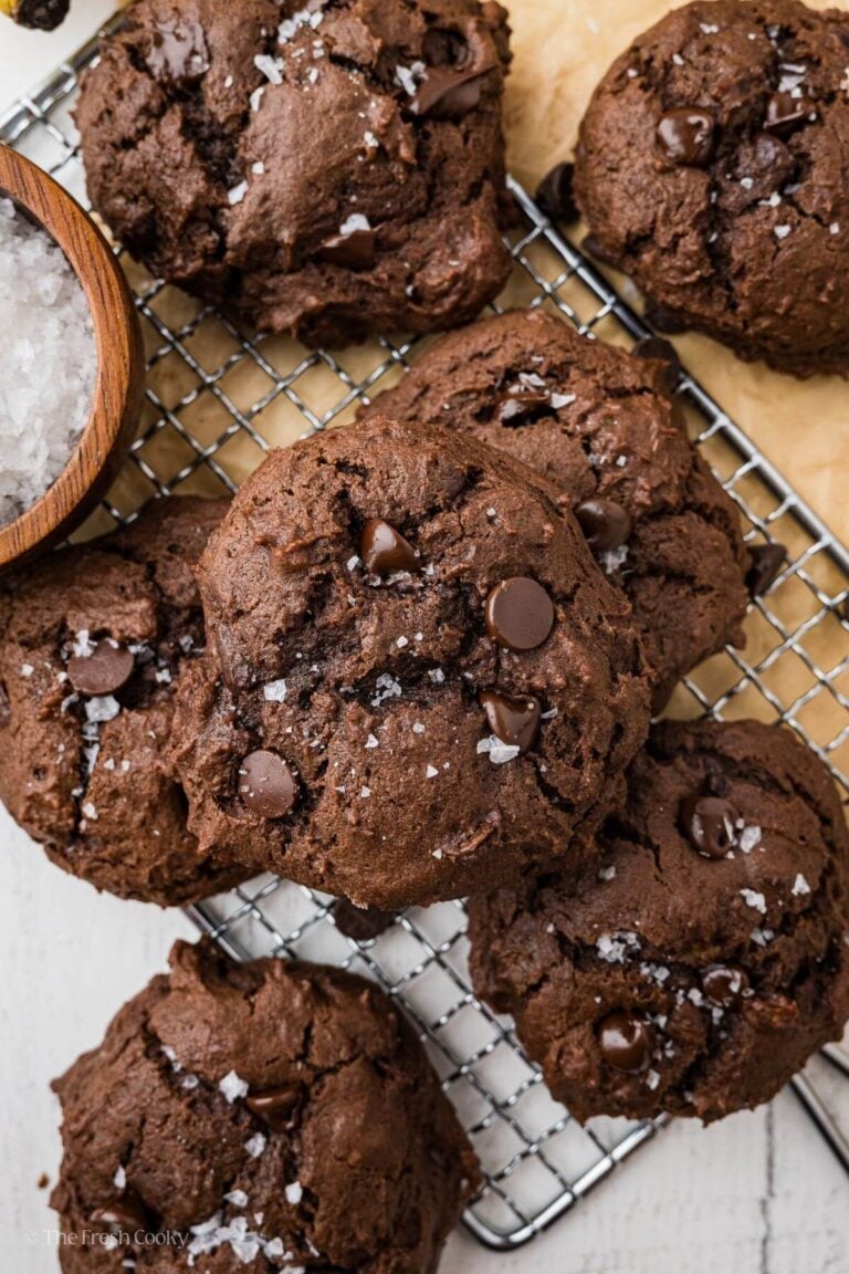 Overhead shot of banana chocolate chip cookies on a cooling rack.