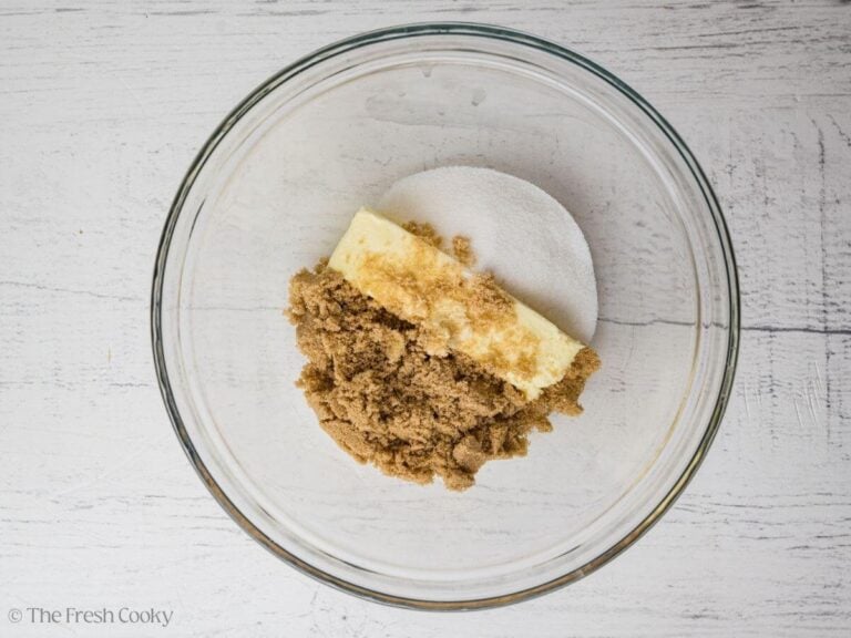 Butter and brown sugar and granulated sugar in a bowl.