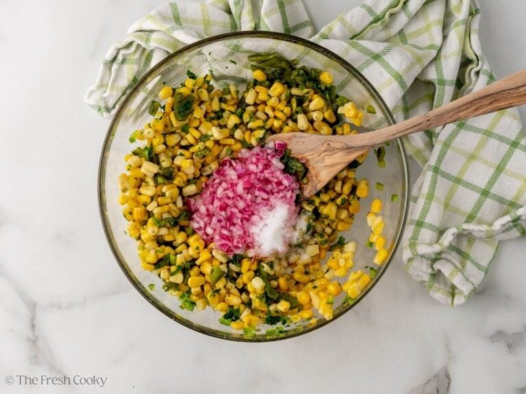 Red onion with citrus juice and salt added to the salsa.
