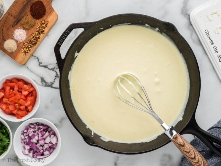 Whisk until all cheese is melted for queso.
