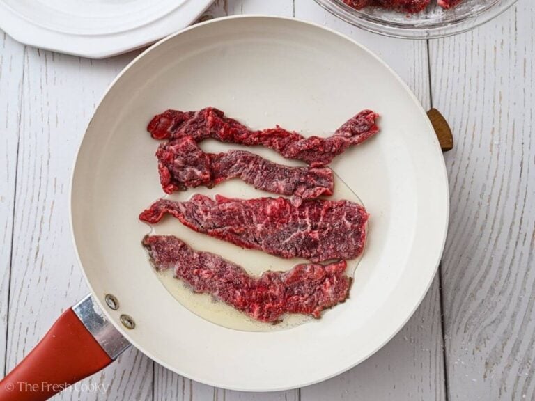 Add beef to pan in strips without crowding.