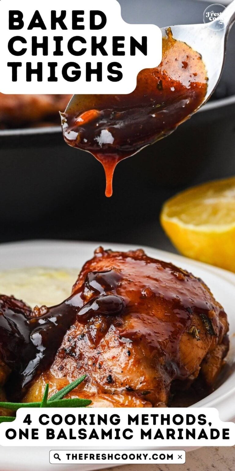 A thick gooey balsamic glaze being drizzled onto golden, sticky balsamic chicken thighs on top of creamy polenta, to pin.