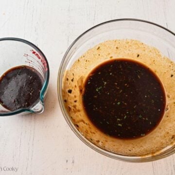 Part of the balsamic marinade in a measuring cup to reserve for later.