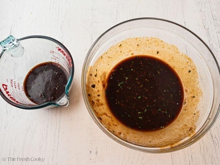 Part of the balsamic marinade in a measuring cup to reserve for later.