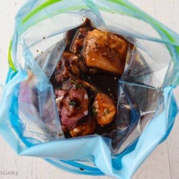 Chicken and balsamic marinade in a ziplock bag.