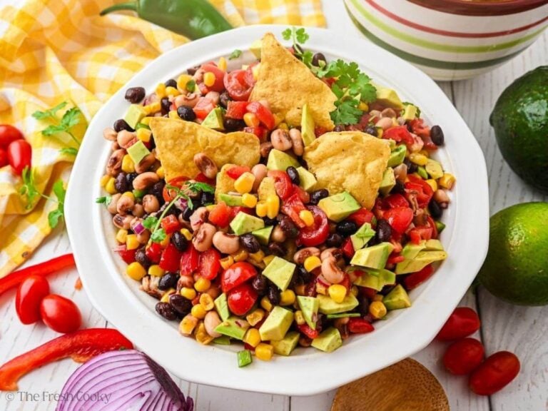Overhead shot of a bowl of cowboy caviar on a table.