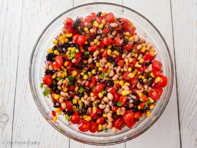 Cowboy caviar all mixed together in a bowl before adding avocado.
