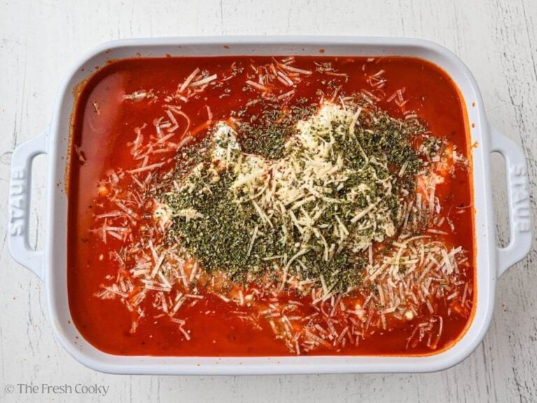 Milk, cottage cheese, spices and shredded parmesan cheese added to the marinara.