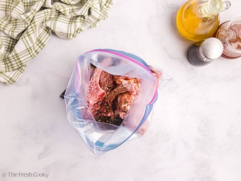 Marinade poured over the top of the pork chops in a bag.