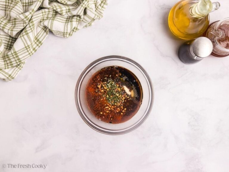 Pork chop marinade ingredients in a small bowl before being mixed together.