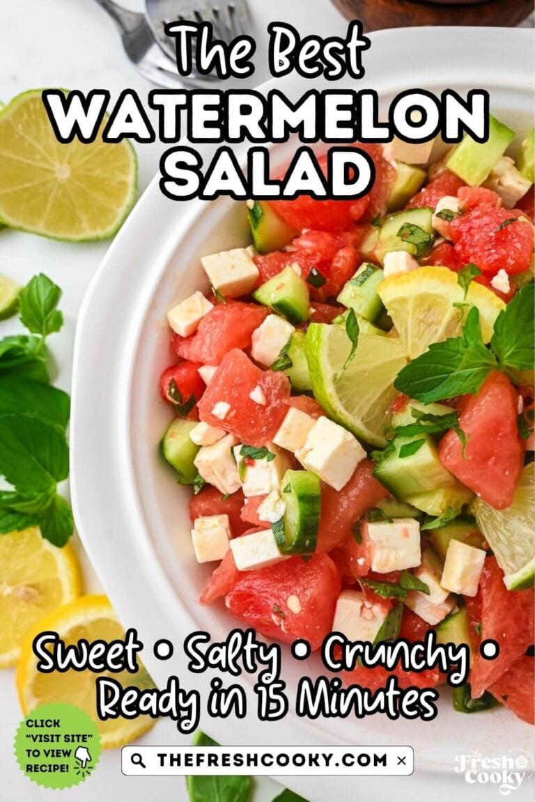 A pretty white bowl filled with crispy watermelon, feta and cucumber salad, tossed in a mint honey lime dressing, for pinning.