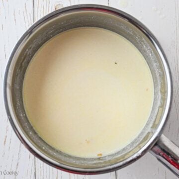 Half and half added to the saucepan.