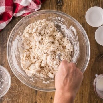 Mixing together buttermilk and flour mixture.