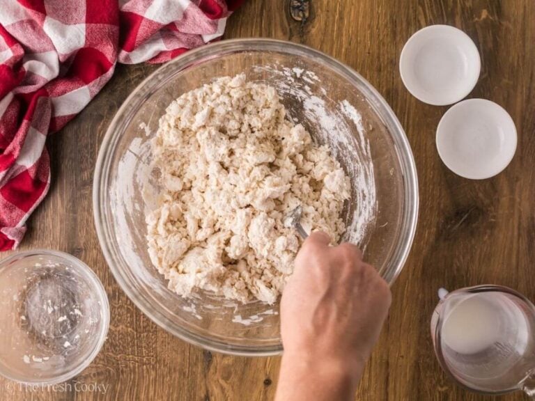 Mixing together buttermilk and flour mixture.