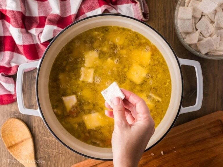 Square dumplings added to the chicken soup.