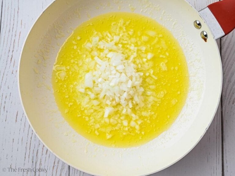 Butter in a skillet with onion.