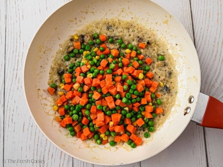 Corn, peas and carrots added to the mushroom and flour mixture.