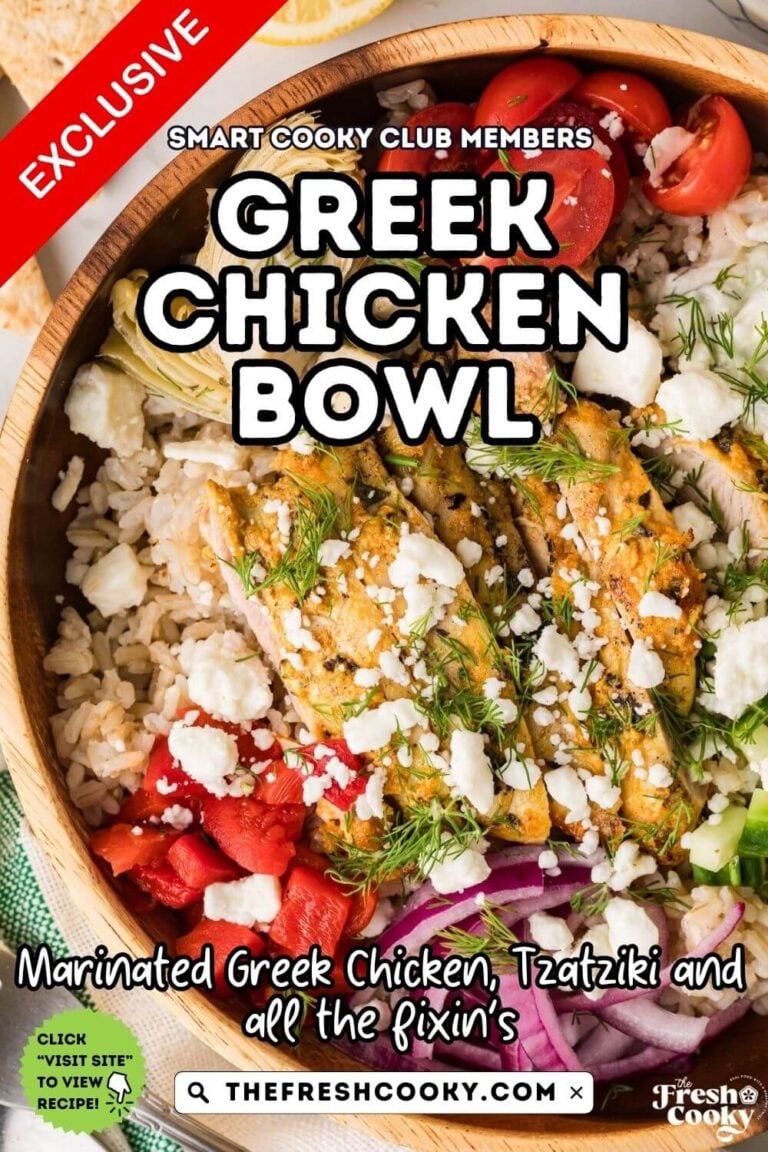 Greek chicken bowl in a pretty wooden bowl, topped with grilled marinated chicken, olives, artichoke hearts, red onions, red peppers, cucumbers and feta cheese, for pinning.