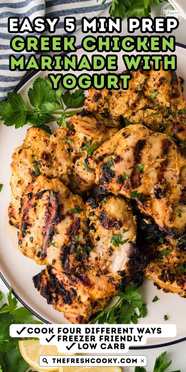 A close-up of a plate filled with grilled, Greek yogurt marinated chicken thighs, for pinning.
