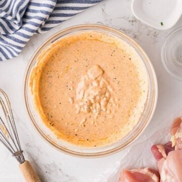 Greek yogurt chicken marinade in a bowl.