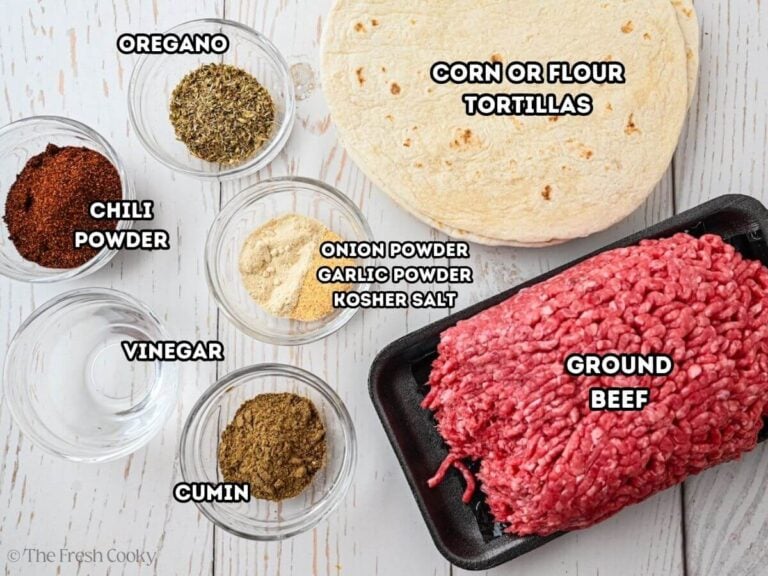 Ingredients needed to make ground beef tacos.