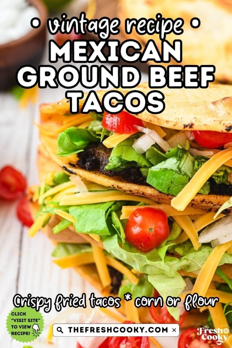 Close up of two stacked ground beef tacos filled with taco fillings and toppings, for pinning.
