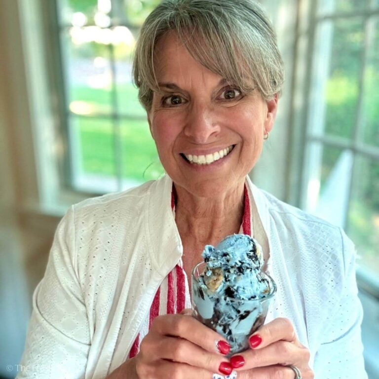 Kathleen holding serving of blue cookie monster ice cream.