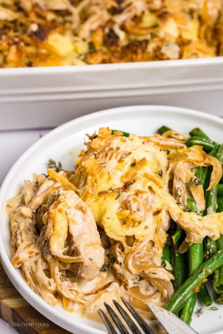 Plate of pork chop casserole with green beans.