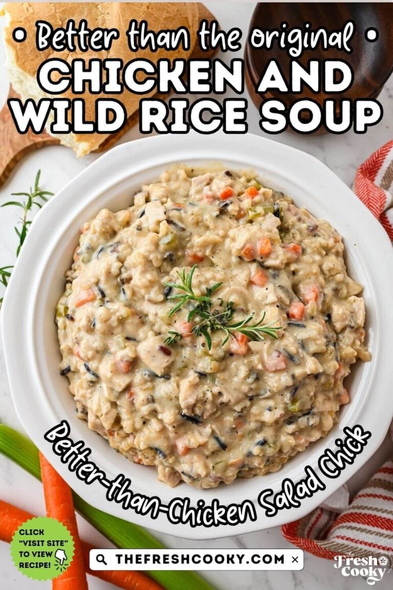 Looking down on a bowl of thick and creamy Chicken Salad Chick Chicken and Wild Rice Soup, on a white plate, for pinning.