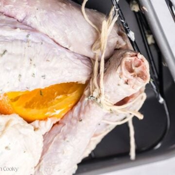 Two turkey legs tied together with cooking twine.
