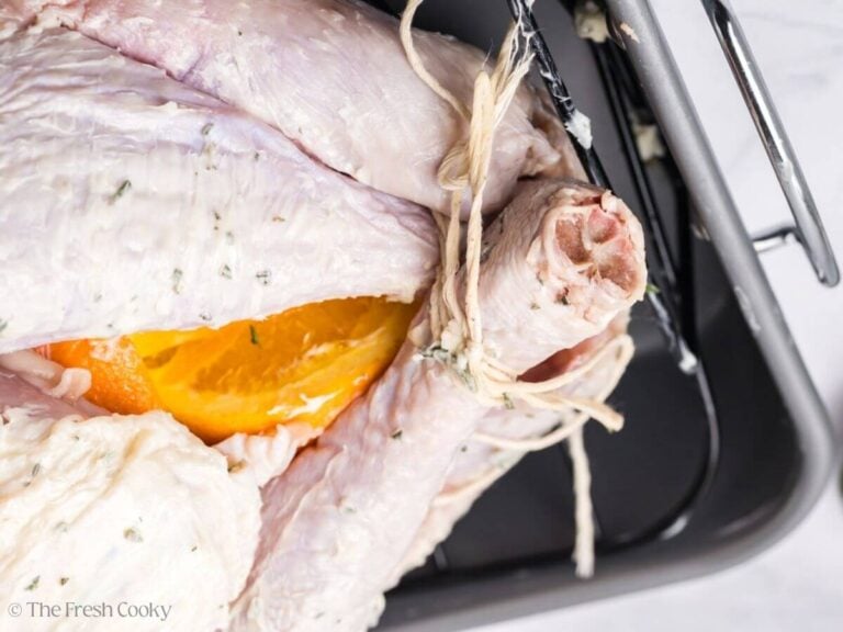 Two turkey legs tied together with cooking twine.