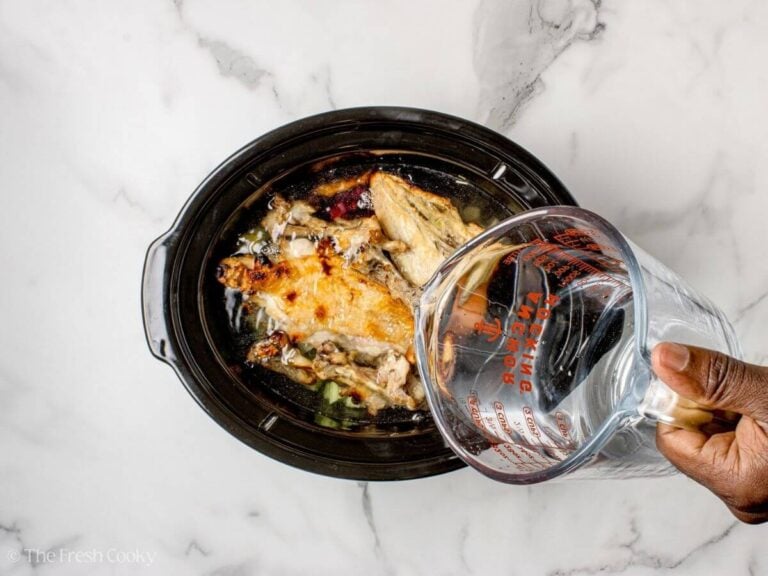 Chicken carcass and water in the slow cooker.