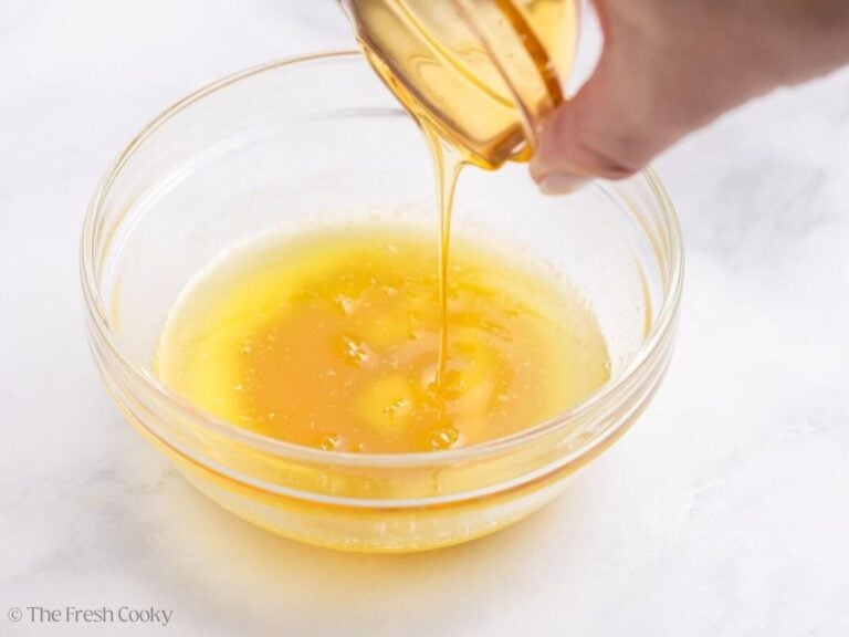 Adding honey to butter for spiral ham.