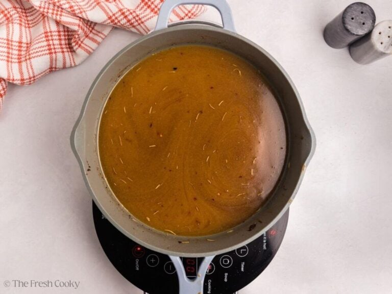 Maple glaze in a skillet before simmering.