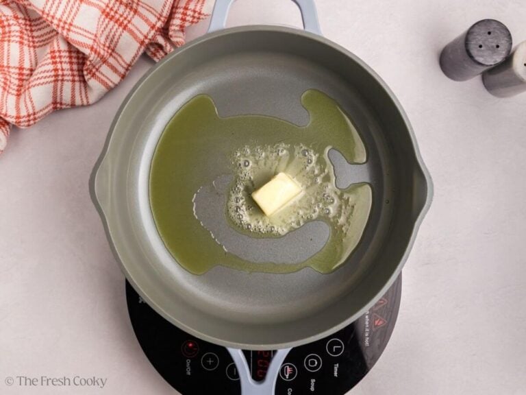 Butter melting in a skillet.