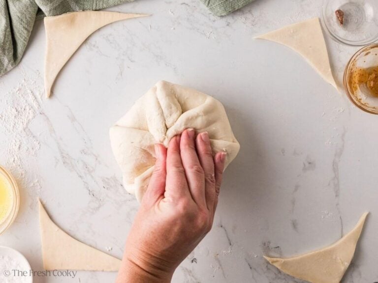 Brie wrapped in puff pastry and pinched closed.