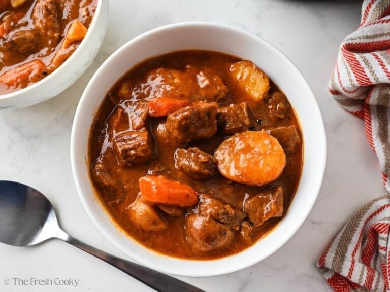 White bowl served with slow cooker beef stew.