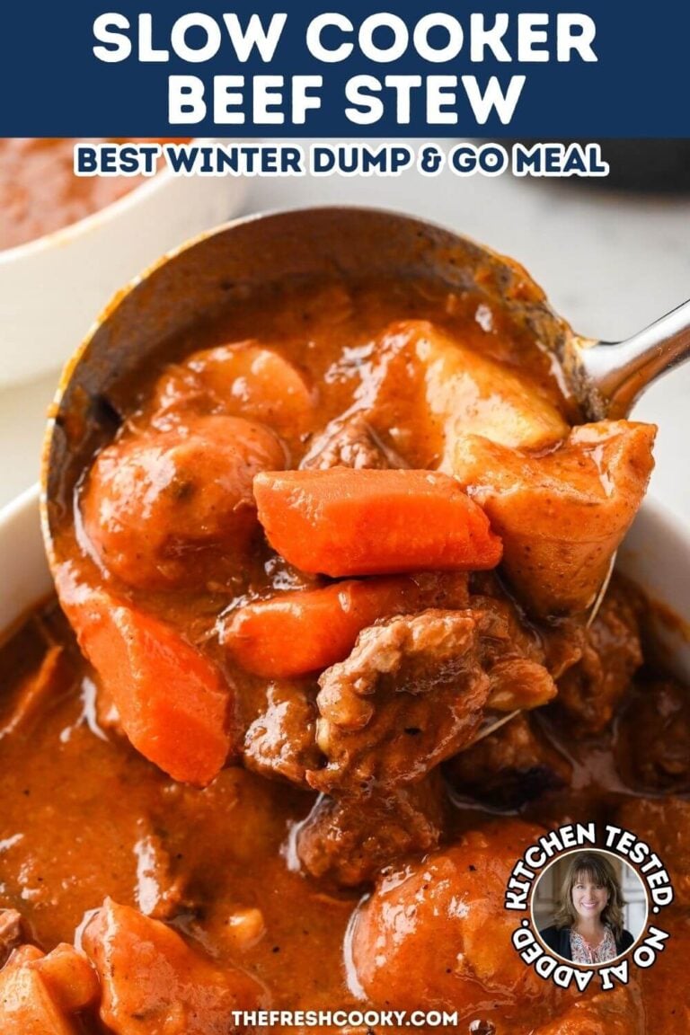 A ladle spooning a serving of rich, slow cooked beef stew into a white serving bowl, for pinning.