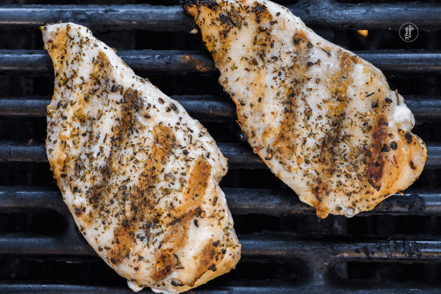 Chicken breasts on grill with grill marks, for green goddess cobb salad.
