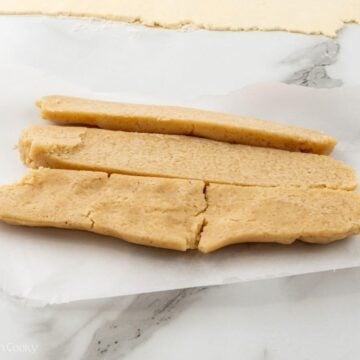 Almond paste sliced into three pieces.