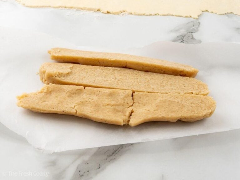 Almond paste sliced into three pieces.