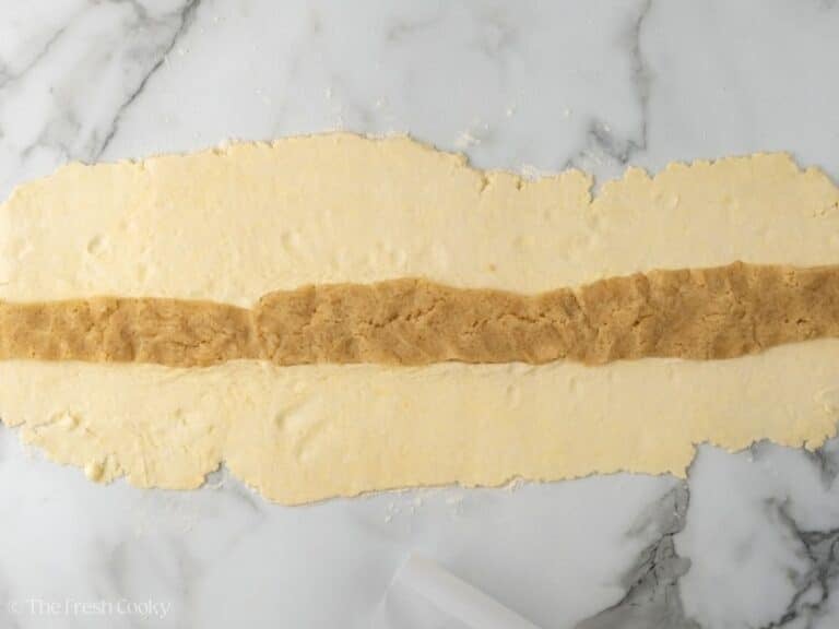 Almond paste added in strip down the middle of the pastry dough.
